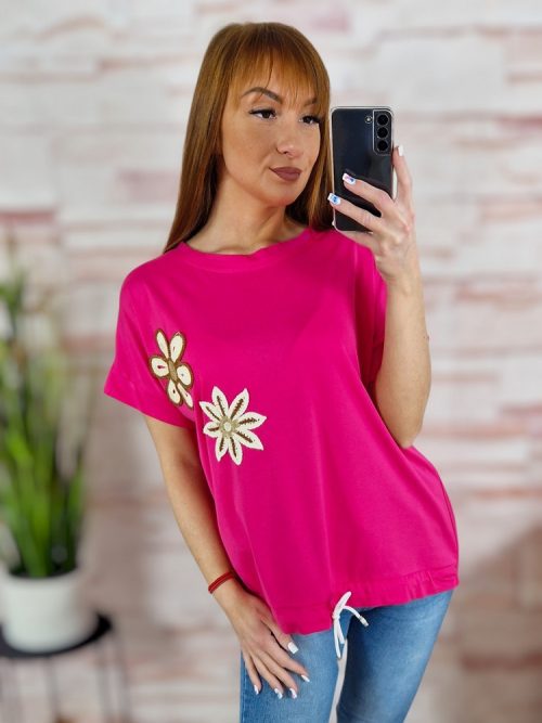 Hímzett virágmintás, hátul hosszított, alján összehúzható felső M-L