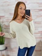 Kötött, v nyakú, kerekített aljú, hosszú ujjú felső M-L