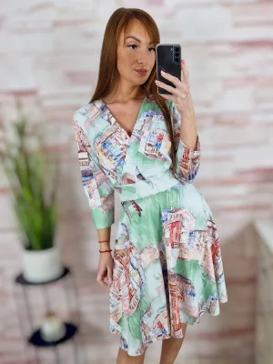 Városos mintás, mellnél átlapolt, loknis aljú ruha S-M