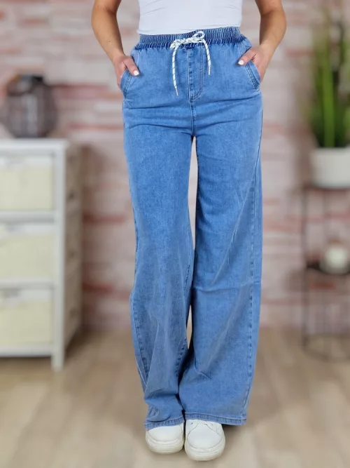 Gumis derekú, bő és hosszú szárú, világoskék farmernadrág XS-XL-ig