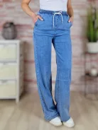 Gumis derekú, bő és hosszú szárú, világoskék farmernadrág XS-XL-ig